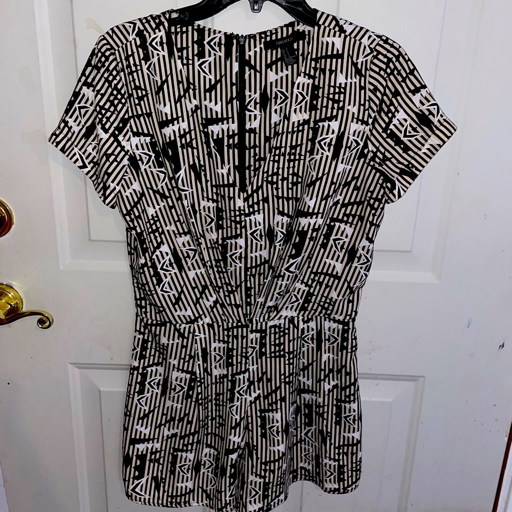 Pinstripe romper with v-neck.